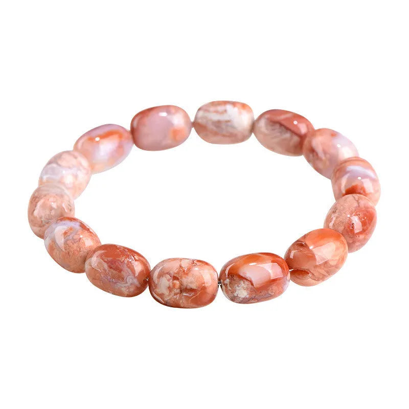 Natural cherry agate bracelet with barrel shaped beads and carved Ruyi symbols