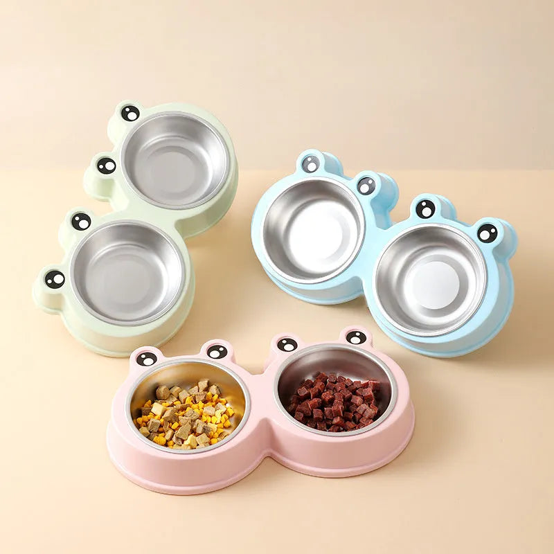 Stainless steel pet double bowl with frog design showing separate food and water compartments