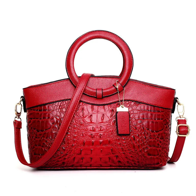 A casual fabric ladies handbag in one of six colours, showing external design and internal phone and ID pockets.
