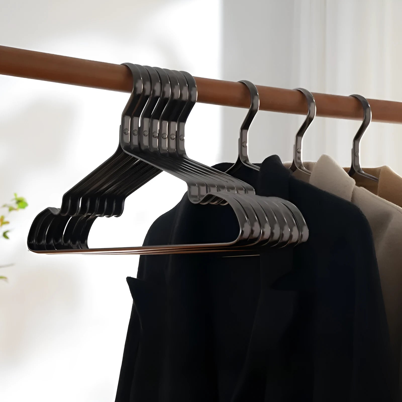 Elegant black non-slip anti-rust clothes hanger for wardrobe organisation