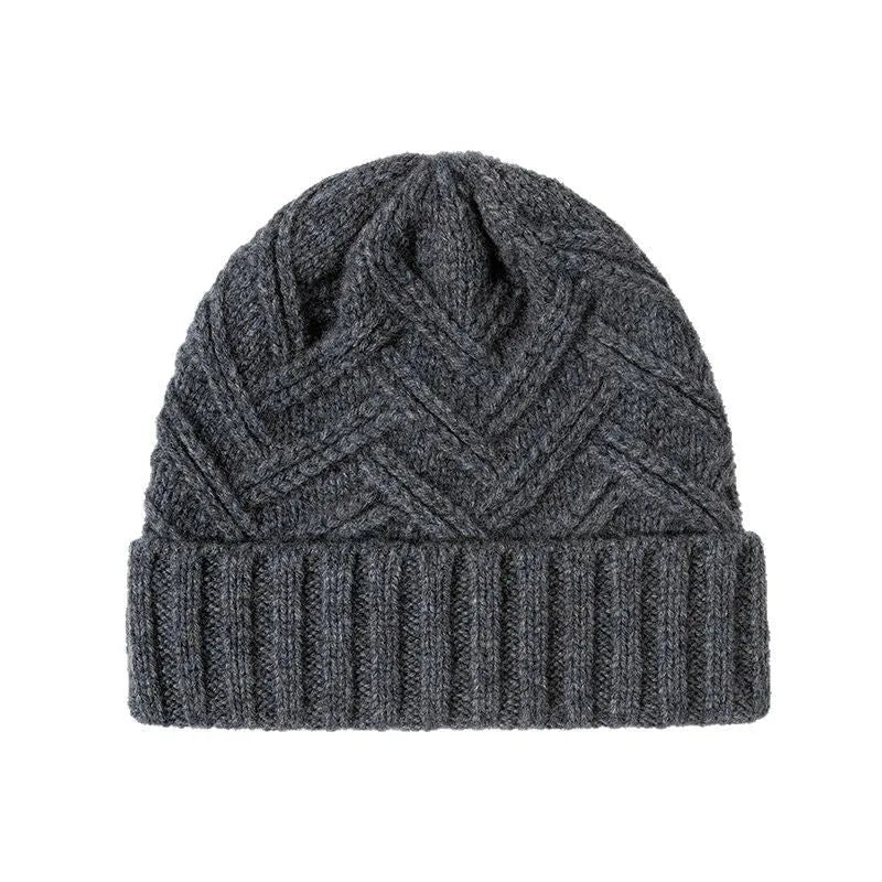 Wool knitted dome hat with totem pattern in ivory white, shown from side angle