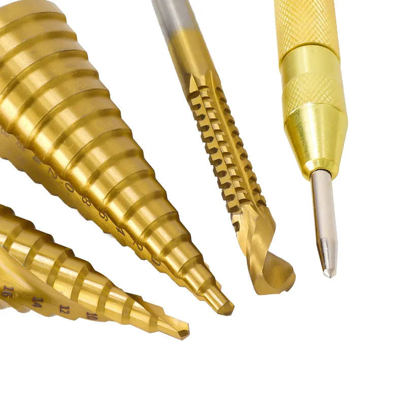 High speed steel step drill bit set with centre punch showing multiple hole sizes from 3mm to 32mm
