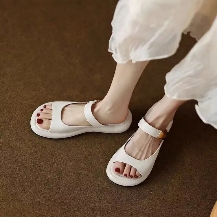 Women's apricot soft leather platform sandals with peep toe and flat rubber sole.