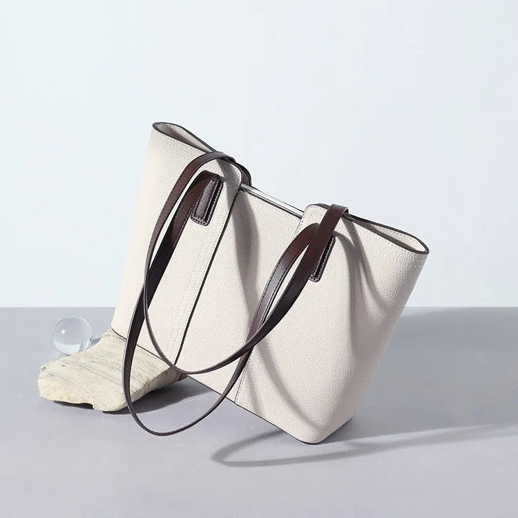 Genuine leather women's shoulder bag in box-type design with shoulder strap, shown in khaki colour