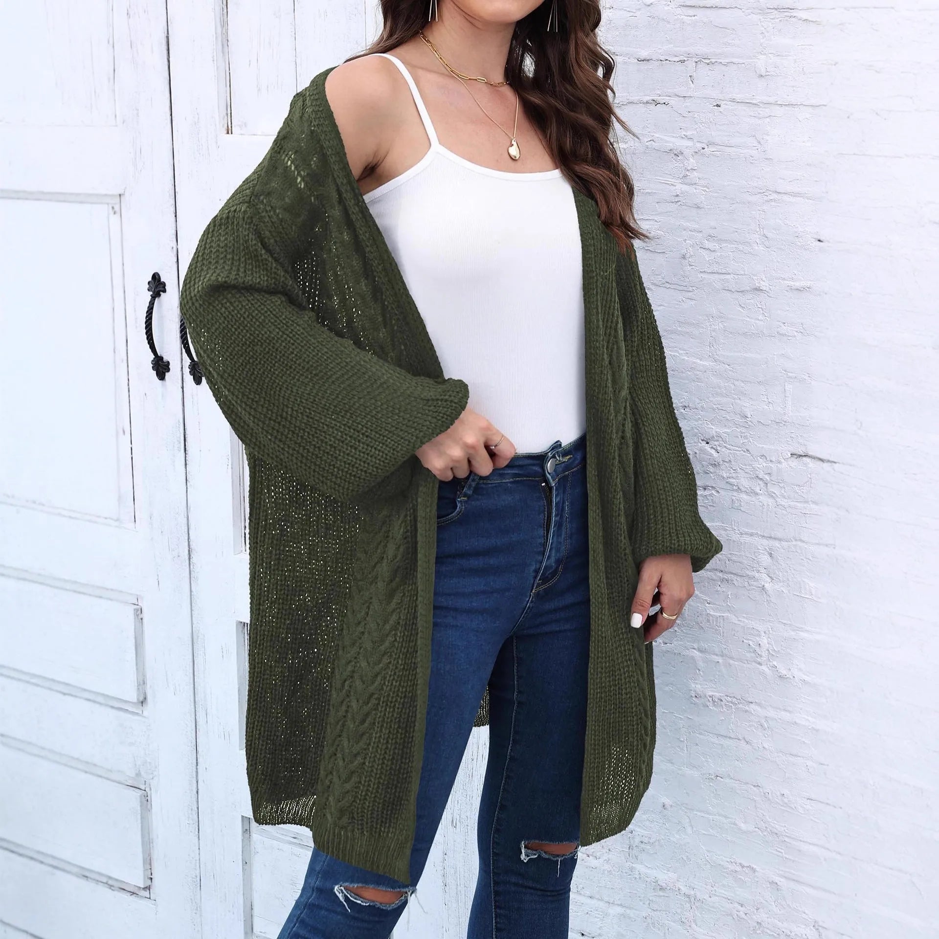 Women's loose acrylic sweater coat in army green colour showing front view