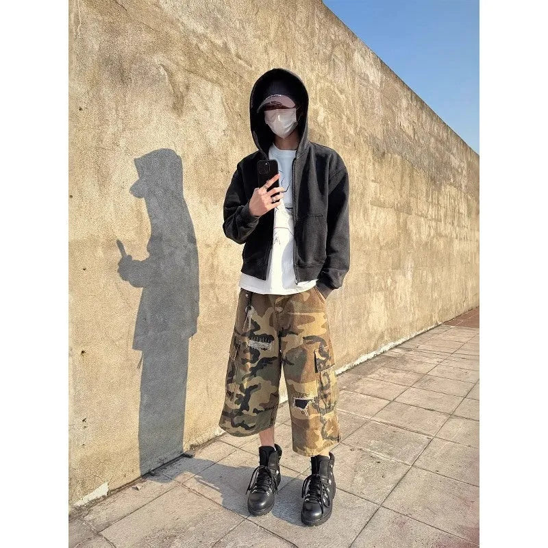 Men's camouflage cropped jeans with retro patches and ripped distressing in straight-leg cut