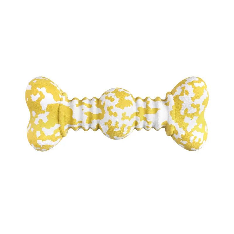 Green, white, and yellow camouflaged natural rubber bone chew toy for large dogs on a plain background.