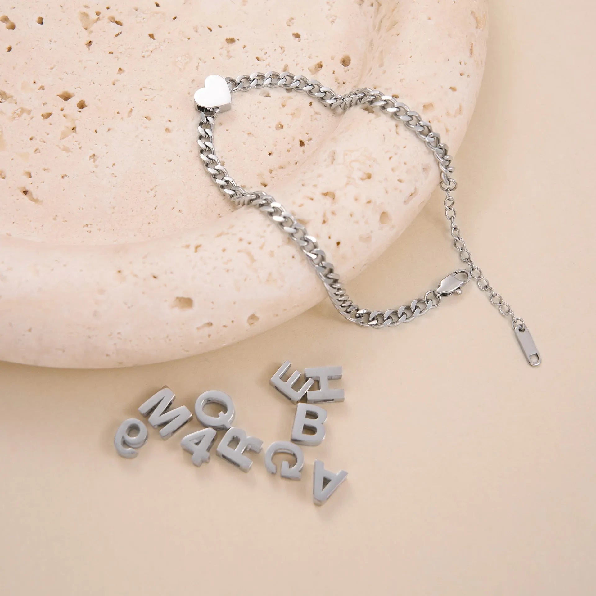 Gold titanium steel necklace with letter A charm on a 40.5cm chain.