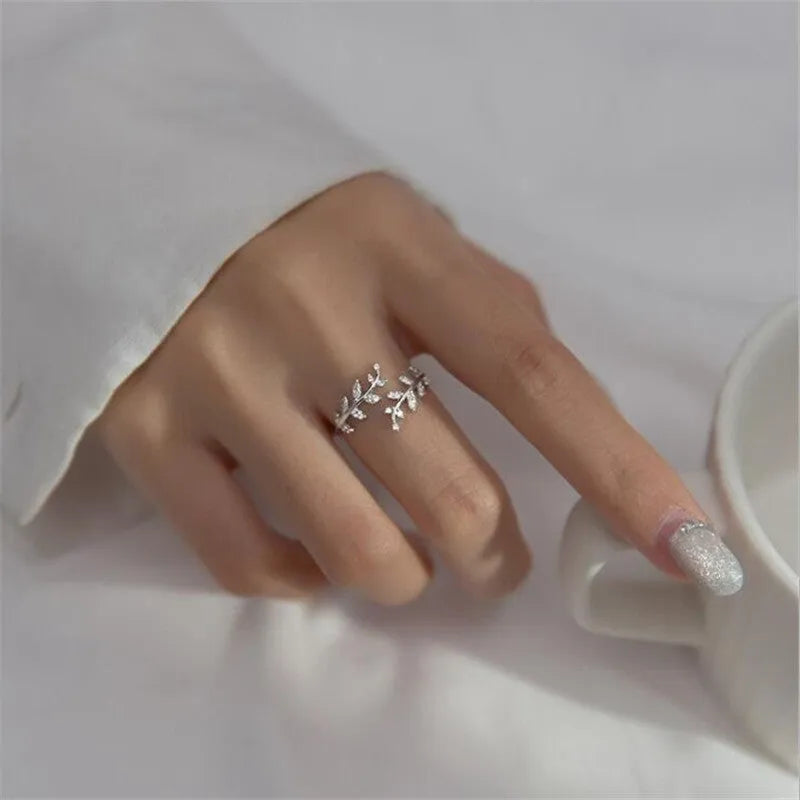 Women's copper branch ring with geometric leaf design in electroplated gold or silver finish