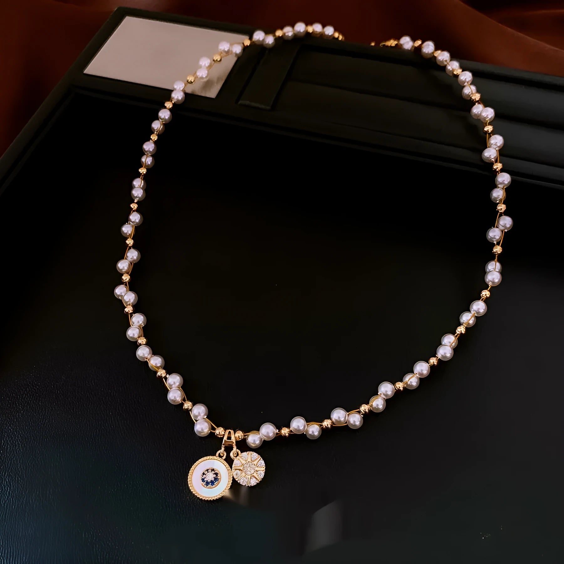 Women's gold electroplated round pendant necklace with zircon and imitation pearl on adjustable clavicle chain