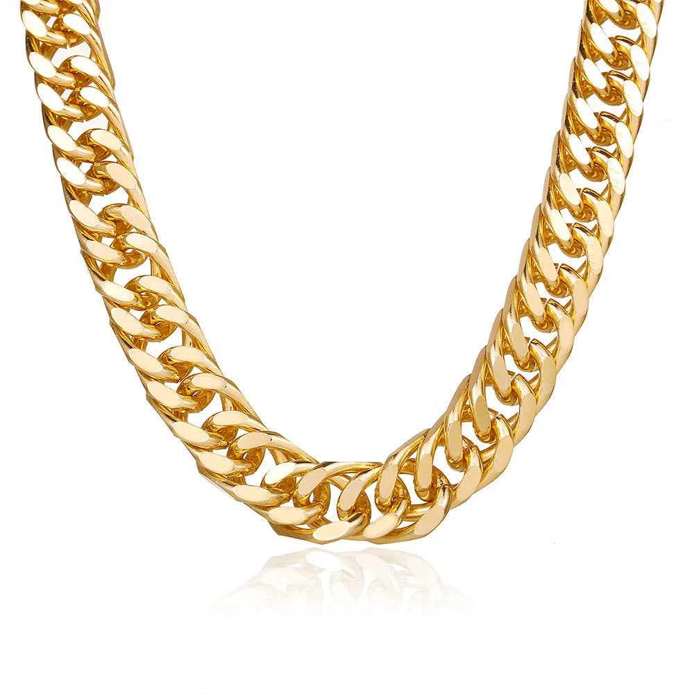 Gold coloured thick chain necklace for women on a white background.