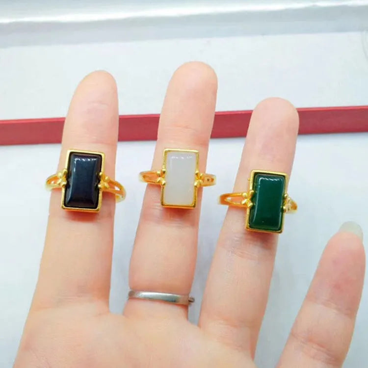 Brass gold-plated adjustable ring with long artificial gemstone in green, white, or black colour option