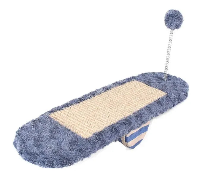 Royal blue cat seesaw toy with scratch board surface on a light background