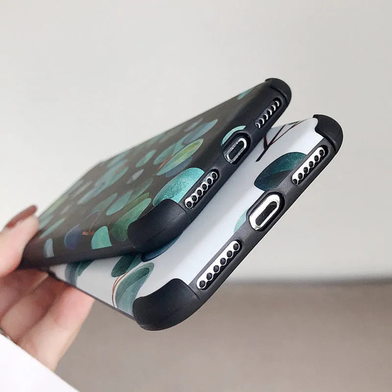 Black silicone iPhone case featuring a raised leaf pattern design.