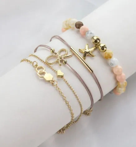 Bohemian bracelet set with alloy vintage bead and boho charm design in bow love style for women