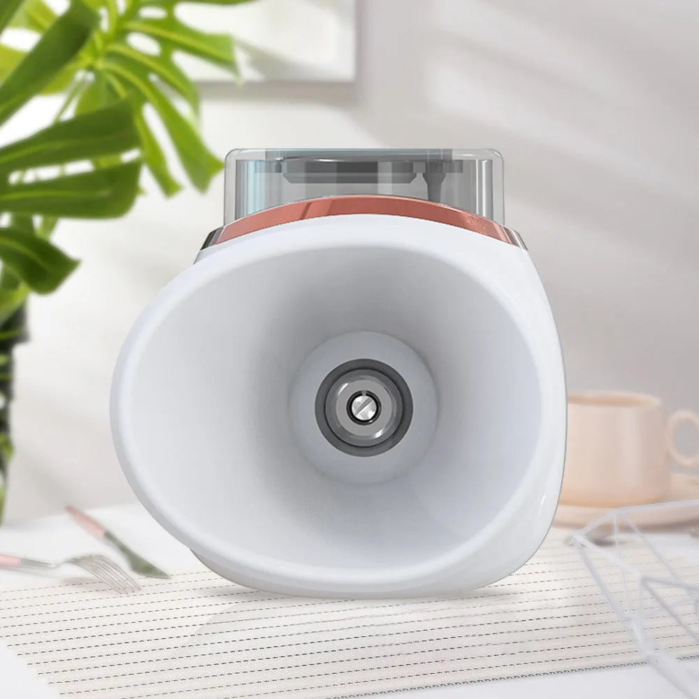 White and purple portable eye humidifier with charging cable on white background