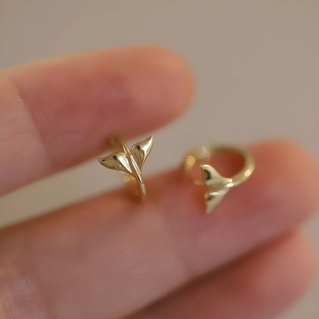 Gold plated sterling silver fishtail earrings with smooth finish and 8-10mm diameter.