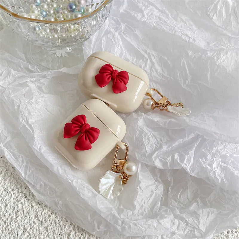 Beige red bow shell TPU case for AirPods wireless earbuds with clamshell design