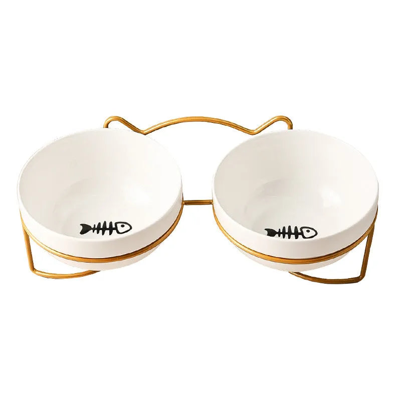 White ceramic cat bowl with decorative pattern and black iron frame support
