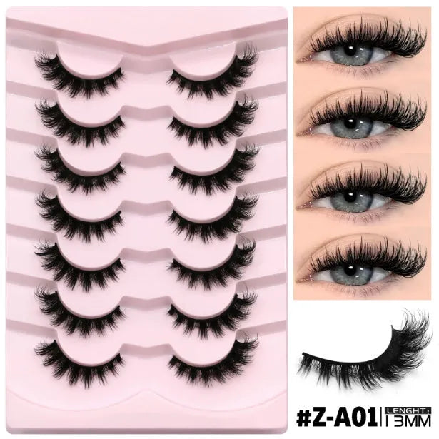 Box of artificial fibre false eyelashes in six styles with a tube of adhesive glue.