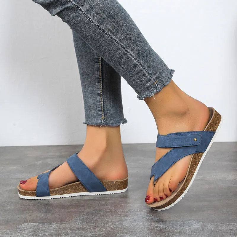 Flat toe ring flip-flops with a thick foam sole in a choice of solid colours on a white background.