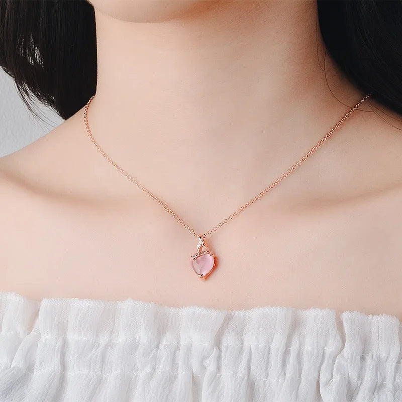 Women's heart-shaped pink synthetic crystal pendant necklace with rose gold electroplated chain