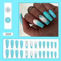 Long ballet shape false nails with solid blue colour and smart blue diamond design, shown with adhesive glue.