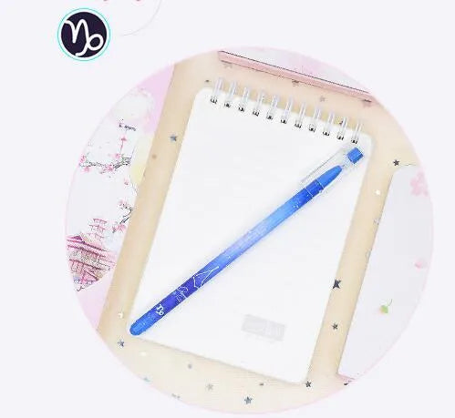 12 quick-drying gel pens with constellation designs in a plastic box