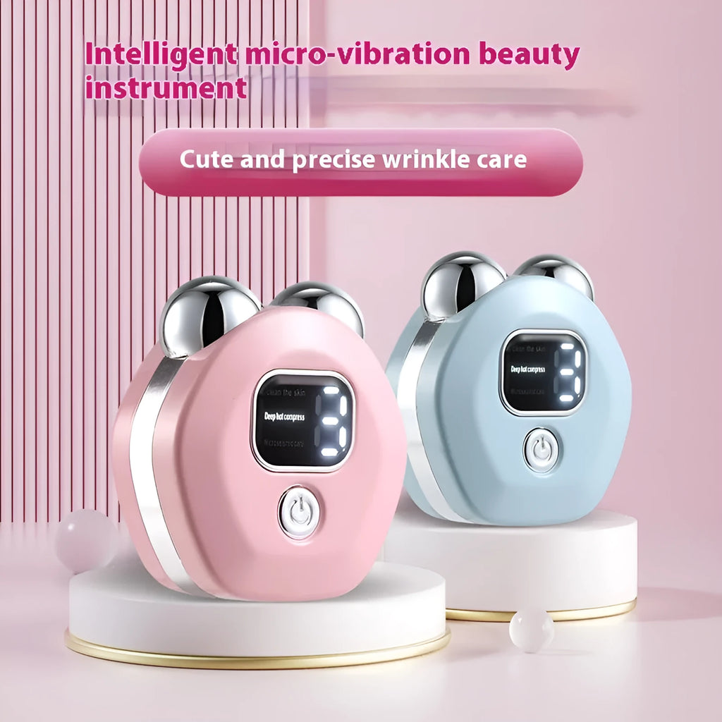 Portable white facial massage instrument with dual rollers and a USB charging cable.