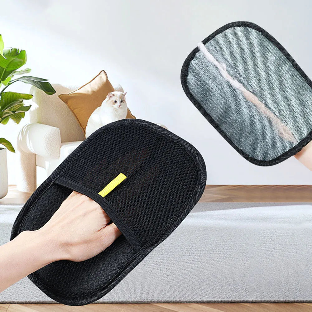Black pet hair remover glove with silicone bristles for deshedding dogs and cats.