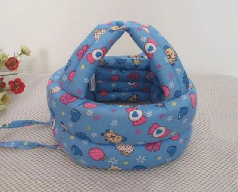 Baby anti collision hat with high-density sponge padding, adjustable headband, breathable cotton outer, colourful design