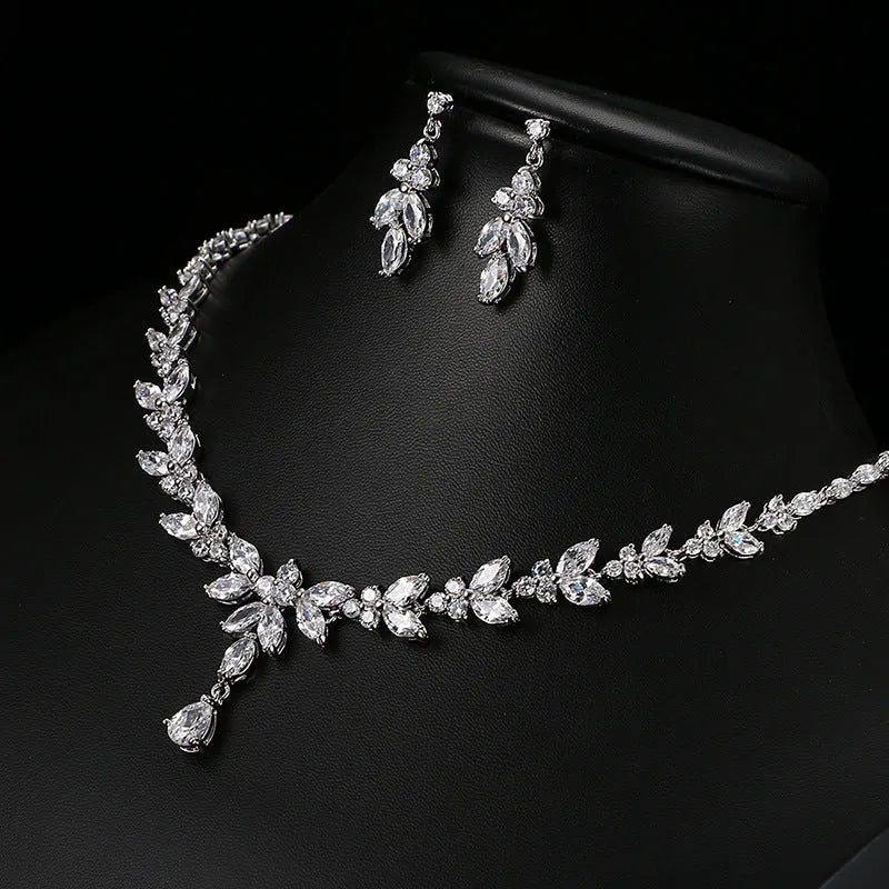Women's alloy necklace and earrings set with gold-plated inlaid artificial gems and zircon chain on black box