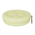Portable dog food and water bowl with integrated snack box compartments in pink and green colour options.
