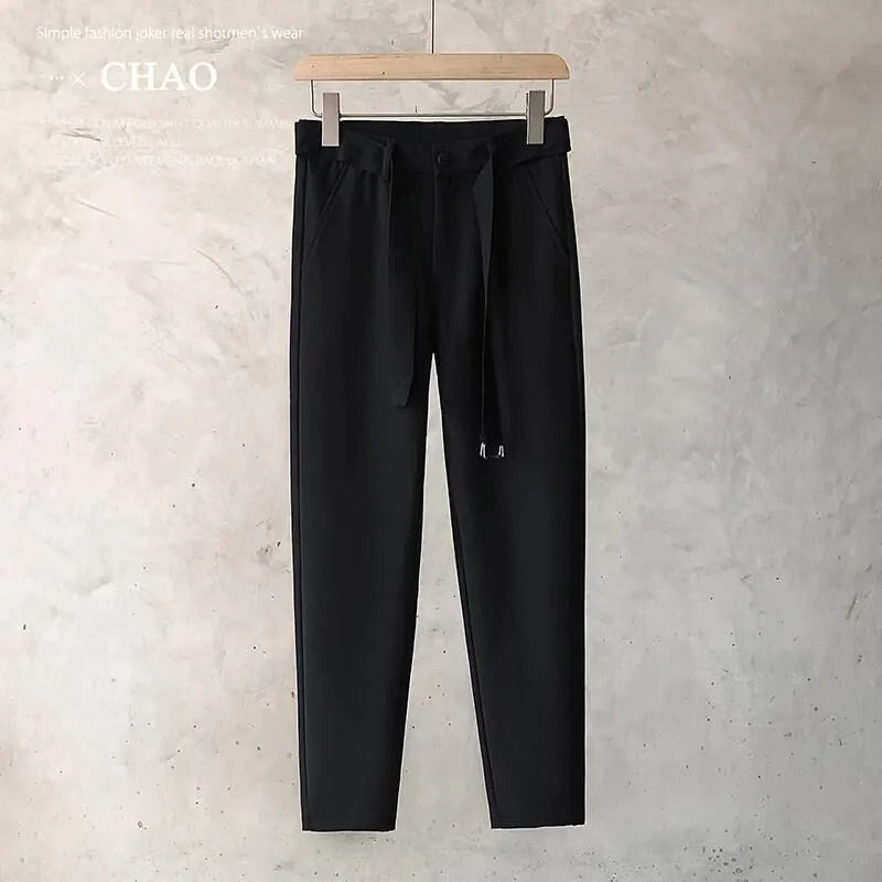 Boys slim straight wool trousers in tapered fit with straight leg opening available in multiple colours