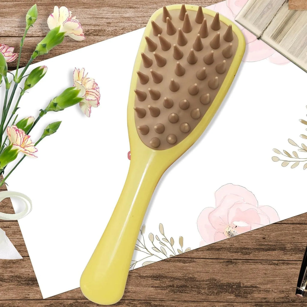 Purple pet silicone shampoo brush with handle on a wet dog coat, designed for gentle bathing and hair removal