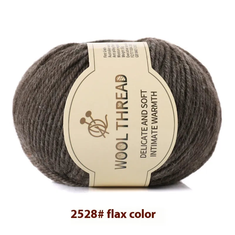 Roll of domestic wool knitting yarn for 10 needles in various colours including green, red, and blue