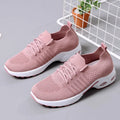 Women's black mesh sneakers with soft sole and round toe on a white background