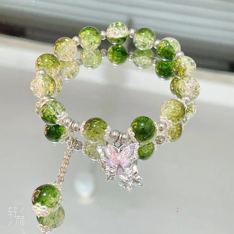 Chinese style bamboo leaf glass bracelet for women with a bamboo joint design.