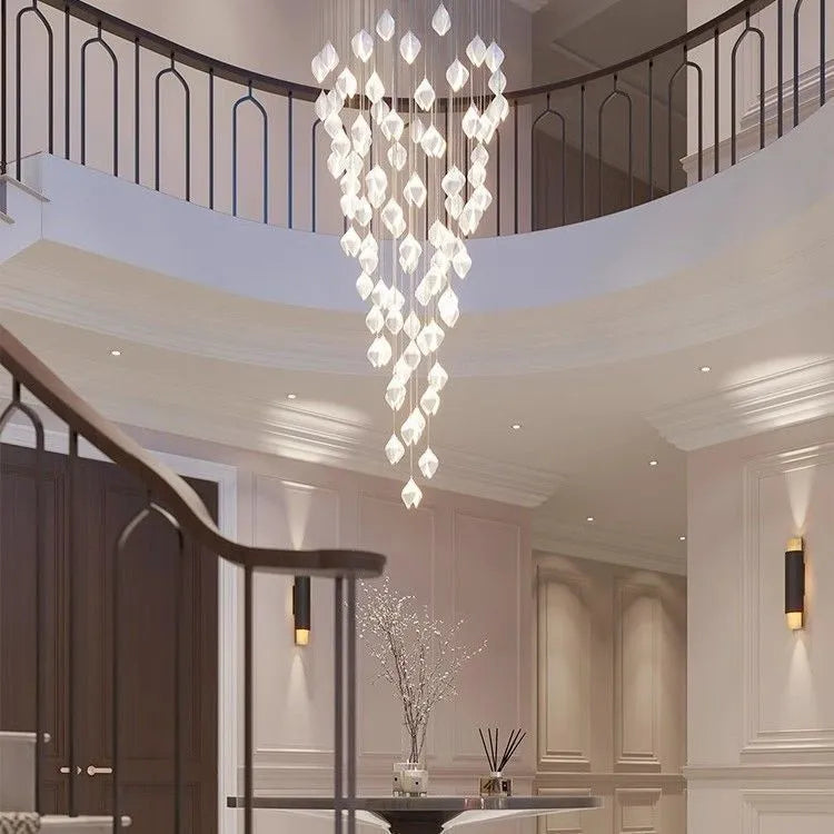 Ceramic magnolia flower-shaped single head pendant chandelier light with a dimmable bulb.