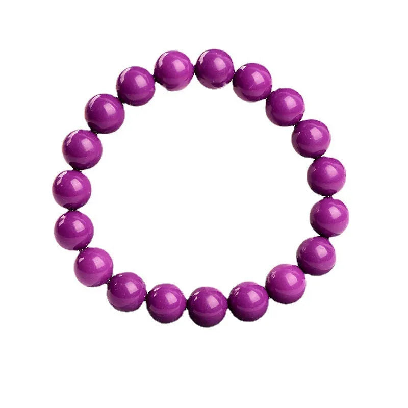 Polished purple mica crystal bracelet with original design on a wrist, showing 5A colour grade.
