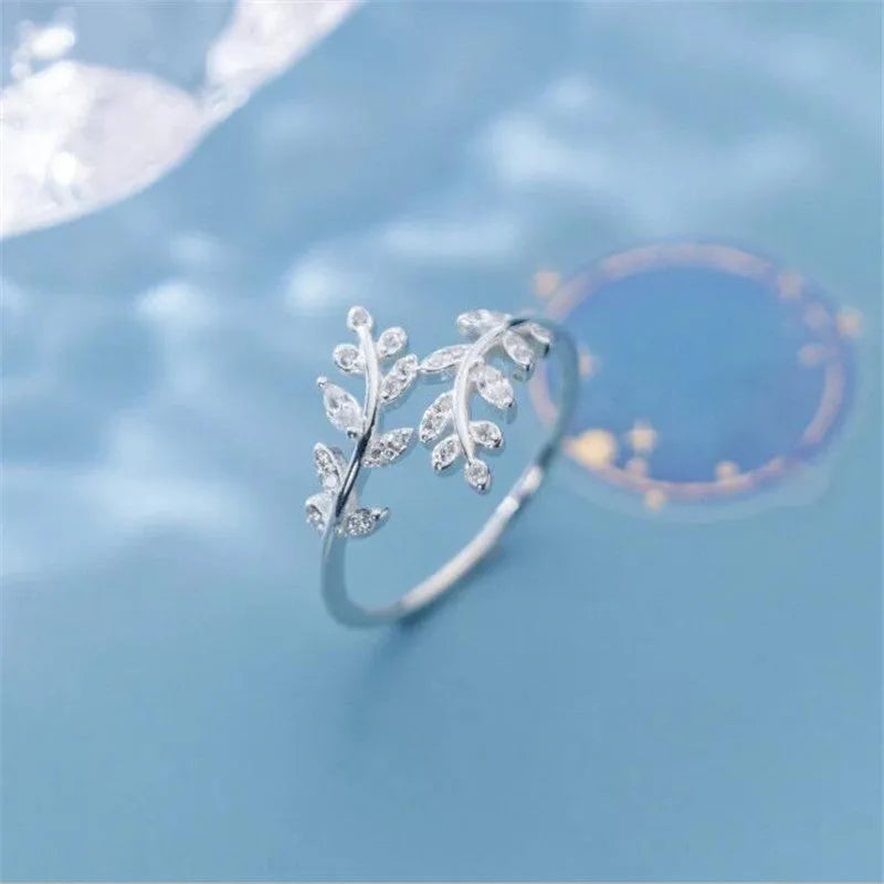 Women's copper branch ring with geometric leaf design in electroplated gold or silver finish