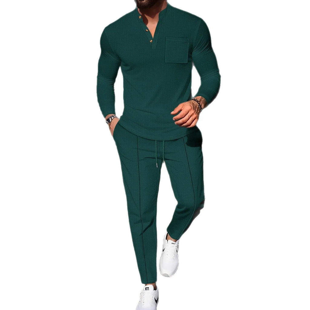 Men's waffle henley long sleeve t-shirt and matching long pants casual set in gray on a model