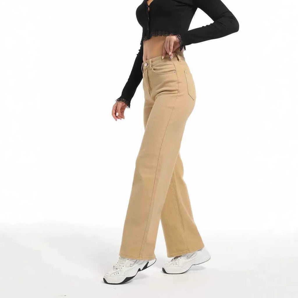 Women's high-waisted wide leg straight jeans in apricot and khaki colours on a model.