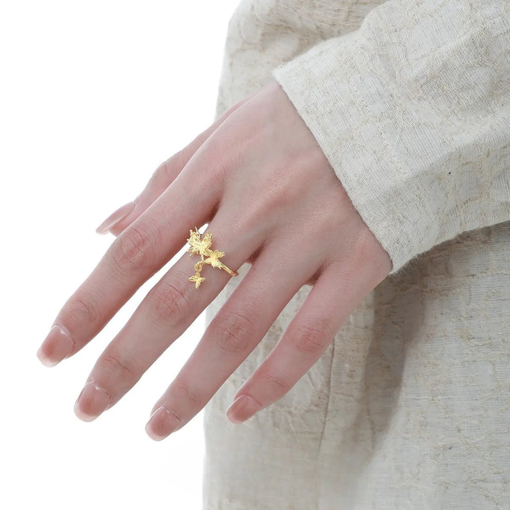 Adjustable opening silver butterfly ring with electroplated finish in white gold or 18K gold colour options