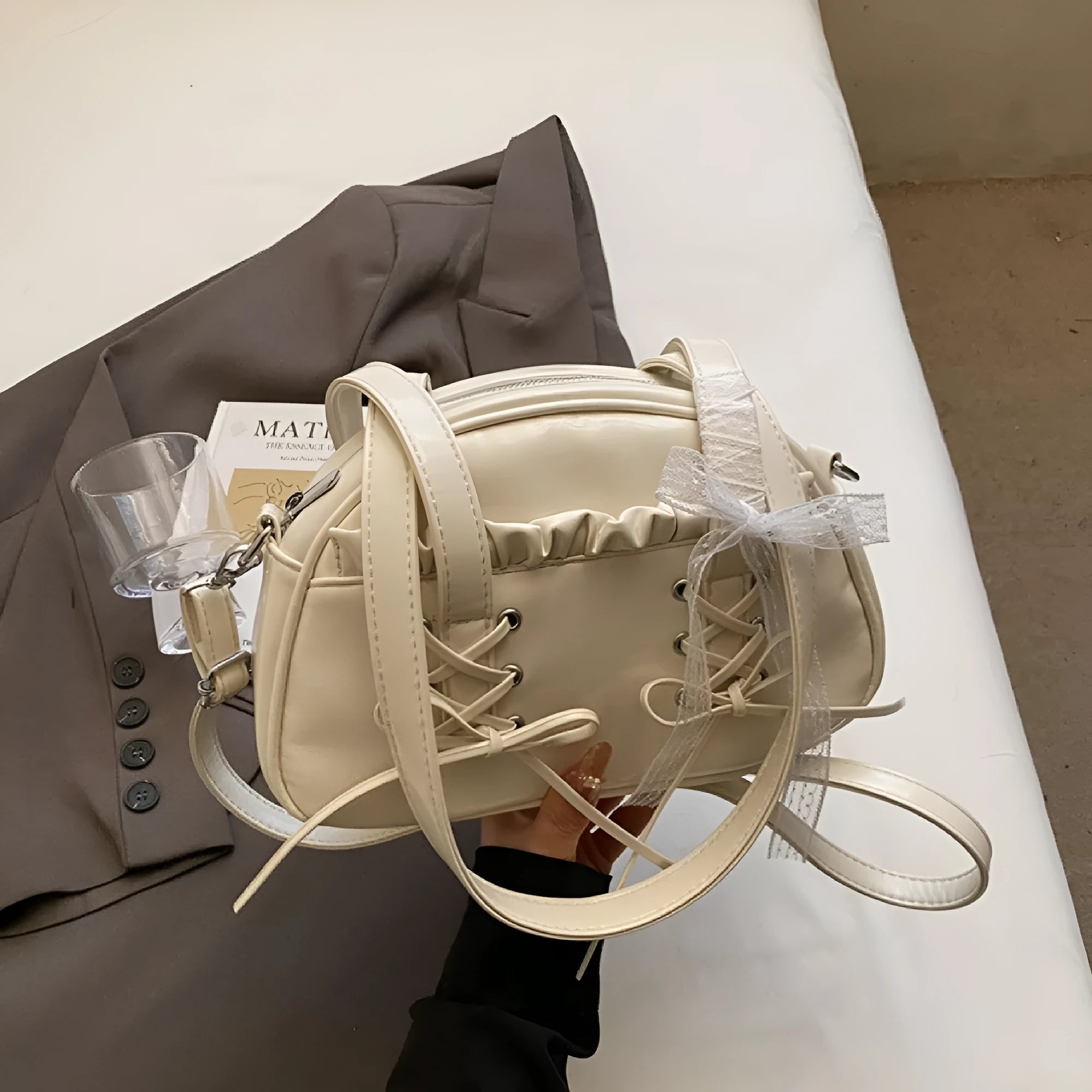 Casual ladies shoulder handbag with bandage bow detail and mobile phone pocket in PU leather