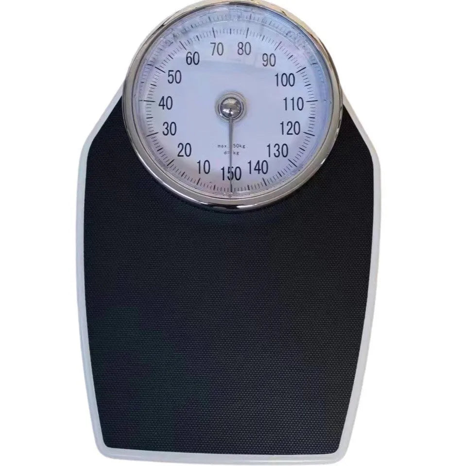 Black mechanical body weight scale with large dial on a simple platform