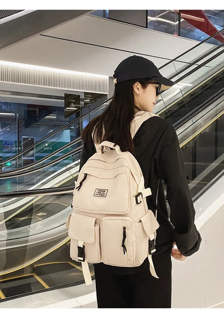 Black nylon student backpack with laptop compartment and front pocket