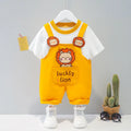 Yellow cartoon short-sleeved overalls for a baby on a hanger, showing the adjustable straps.
