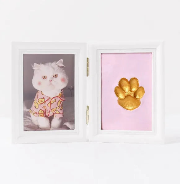 Solid wood cat palm print photo frame with gold lacquer and seal paste kit on table