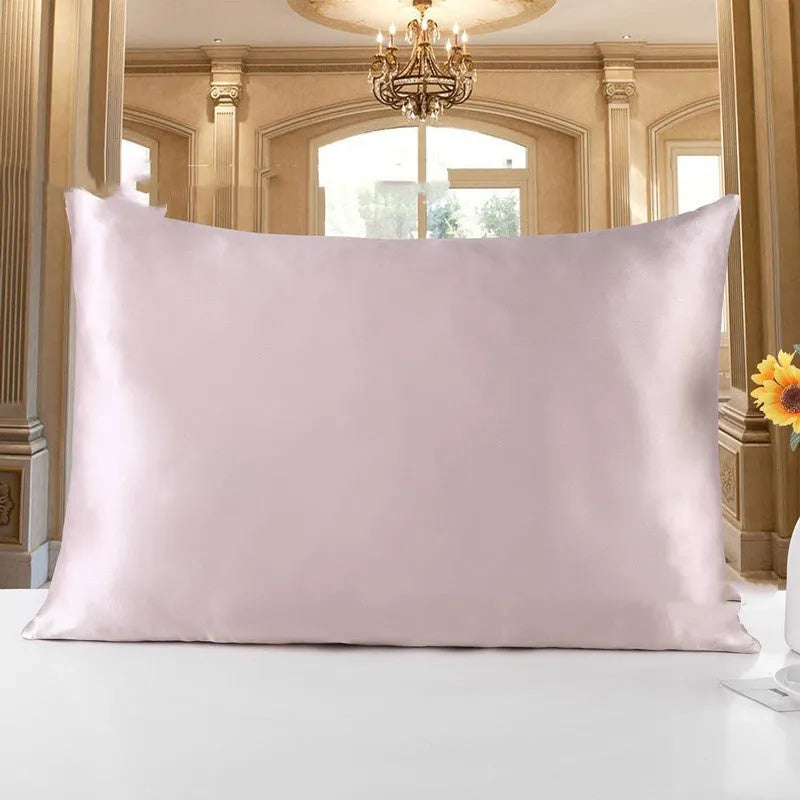 Double-sided 19 M silk pillowcase in apricot colour, showing smooth satin weave texture.